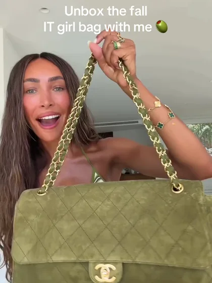 @aimazin filming a bag unboxing