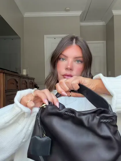 @kelsey.smitth filming a bag unboxing